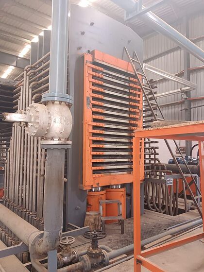 HPL press with hydraulic piping installed